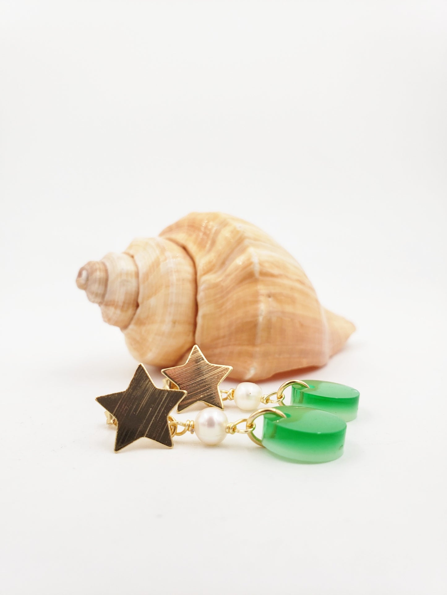 Aretes estrellitas y perlas