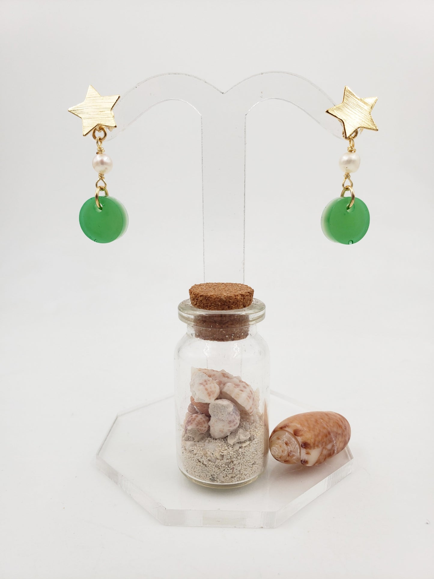 Aretes estrellitas y perlas