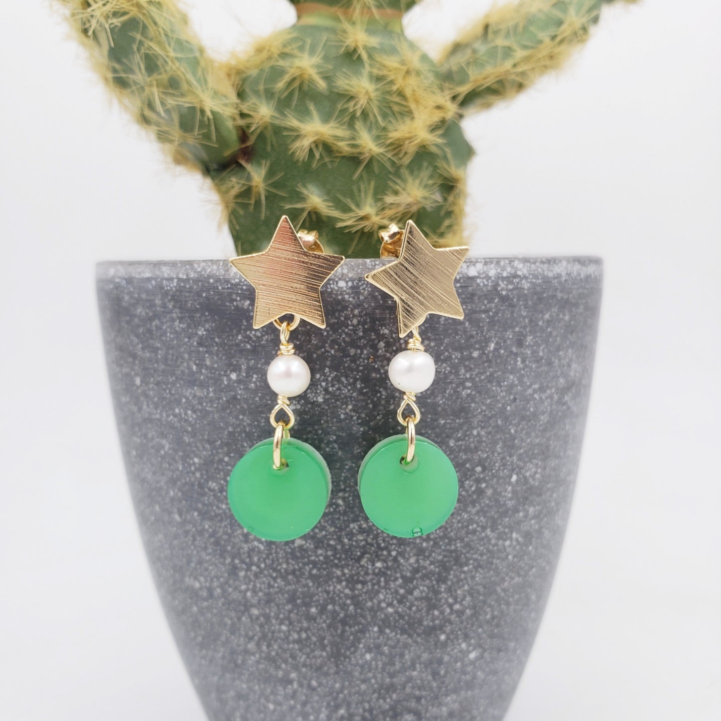 Aretes estrellitas y perlas